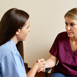 **Image Prompt:** A caring rehabilitation counselor providing support and encouragement to a patient during a therapy session. Focus on the emotional connection and the counselor's expertise.